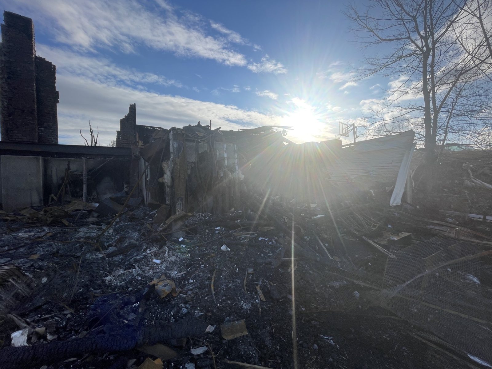 Total fire loss, structure burned to the foundation with the chimney still standing